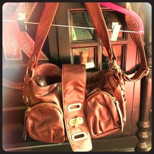 Brown Big Budda cargo bag.